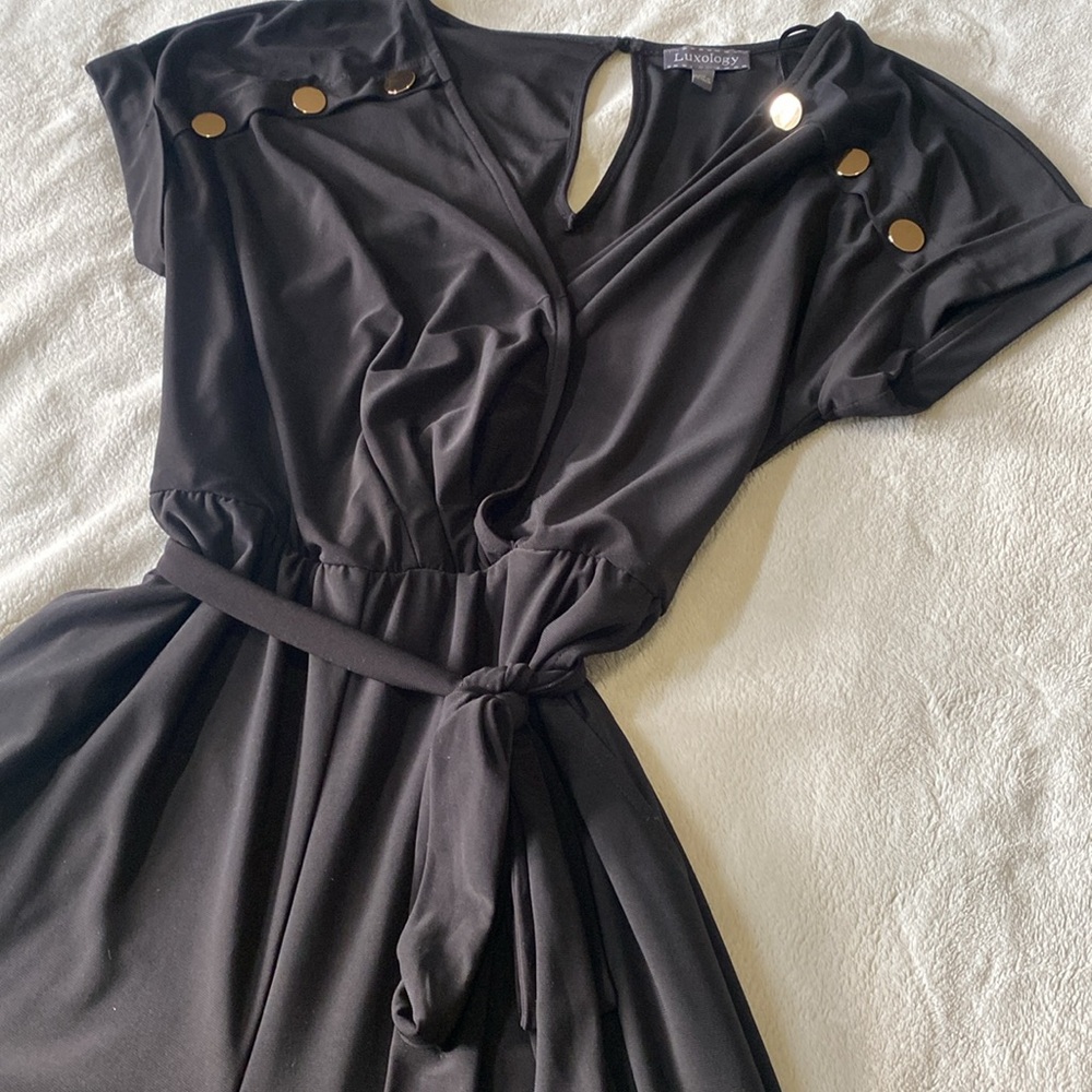 Black Dressy Romper With Pockets And Gold Color Buttons - Picture 4 of 7
